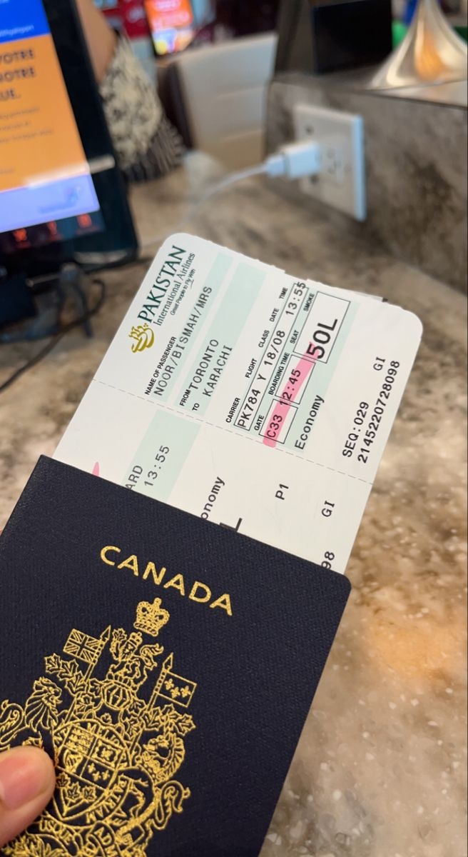 Canadian passport and travel papers in a journey setting